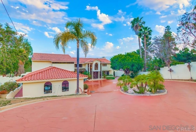 5274 Margaret, Bonita, CA 91902 - view of front of property with a tile roof, stucco siding, and fence