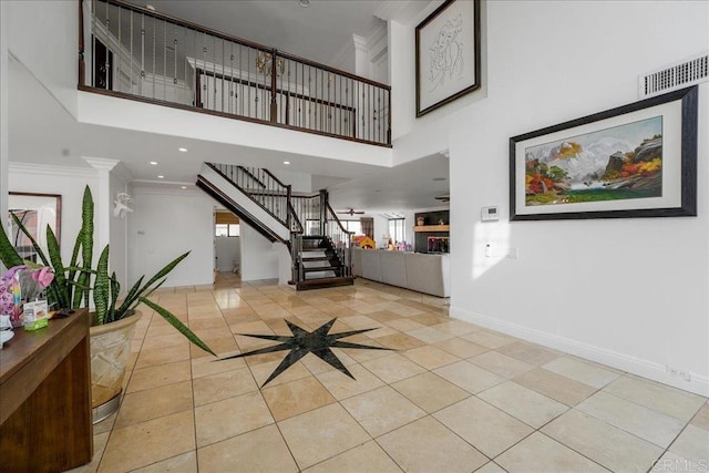5274 Margaret, Bonita, CA 91902 - foyer entrance with baseboards, visible vents, crown molding, and stairway
