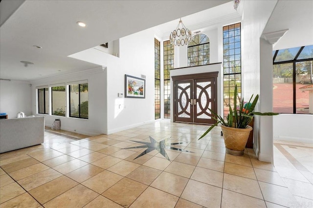 5274 Margaret, Bonita, CA 91902 - foyer entrance with tile patterned floors, crown molding, baseboards, and a chandelier