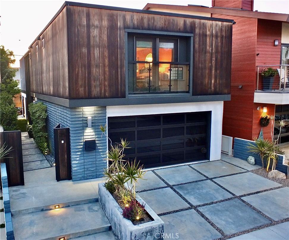 modern home with a garage and concrete driveway