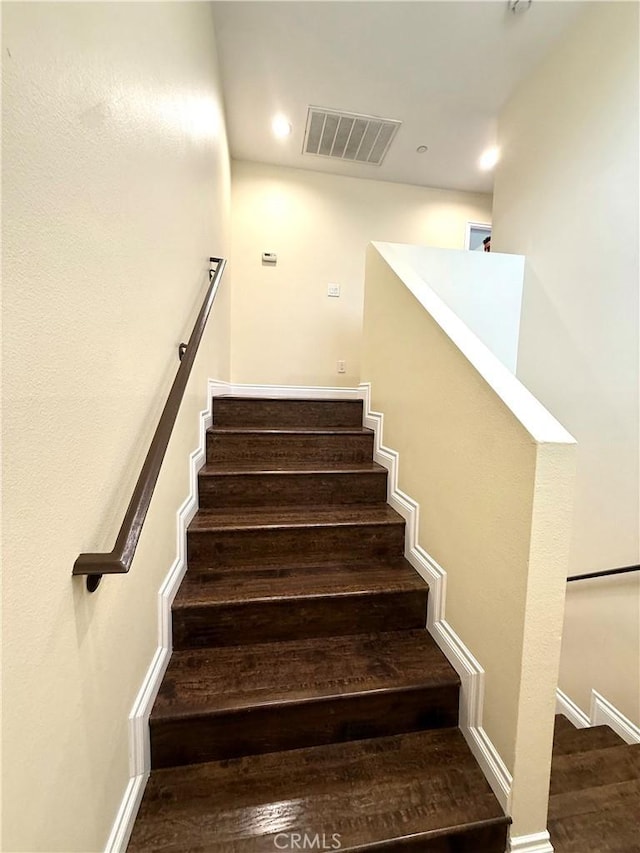 645 E 78th St, Los Angeles, CA 90001 - stairs featuring wood finished floors and recessed lighting