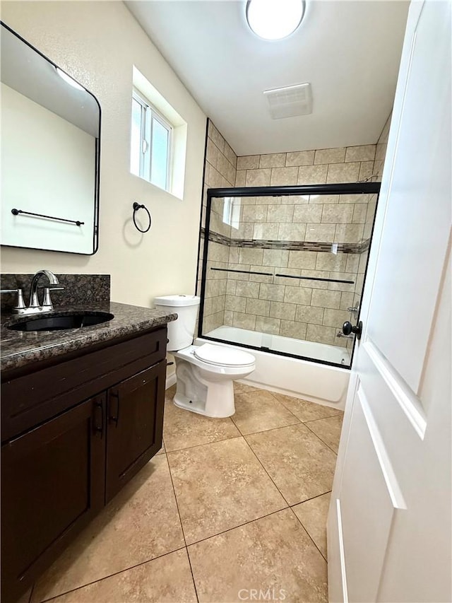 645 E 78th St, Los Angeles, CA 90001 - full bathroom with vanity, enclosed tub / shower combo, and tile patterned floors