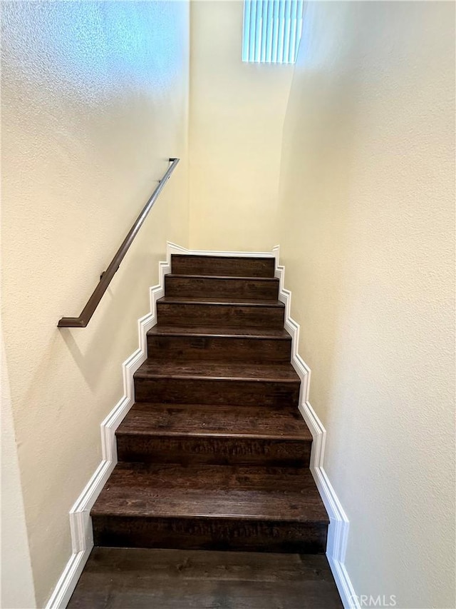 645 E 78th St, Los Angeles, CA 90001 - staircase with hardwood / wood-style floors