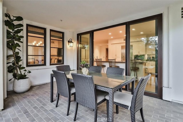 view of patio with outdoor dining area