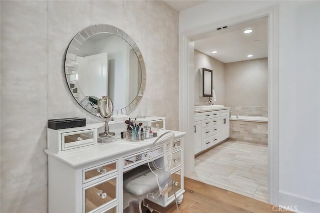 23500 Park Sorrento Unit D34, Calabasas, CA 91302 - full bath with vanity, wood finished floors, and recessed lighting