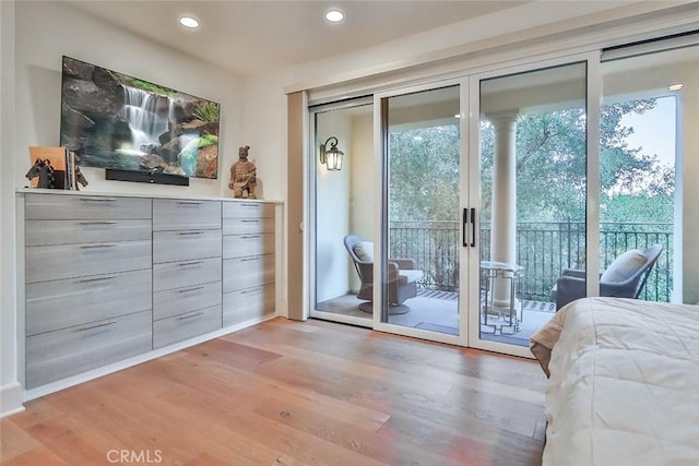 23500 Park Sorrento Unit D34, Calabasas, CA 91302 - bedroom with access to outside, light wood-style flooring, and recessed lighting