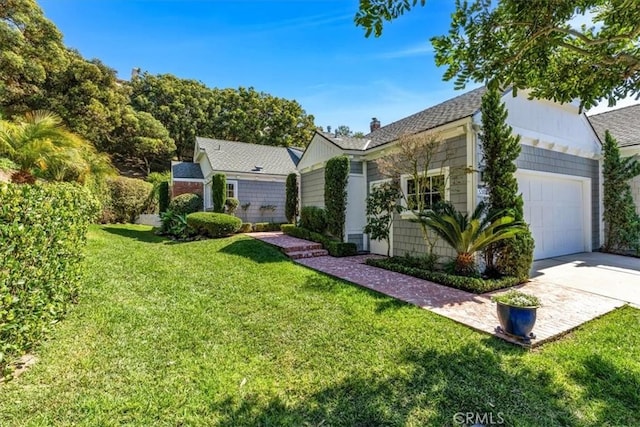 33972 Cape Cv, Dana Point, CA 92629 - view of front of property featuring concrete driveway, an attached garage, and a front yard