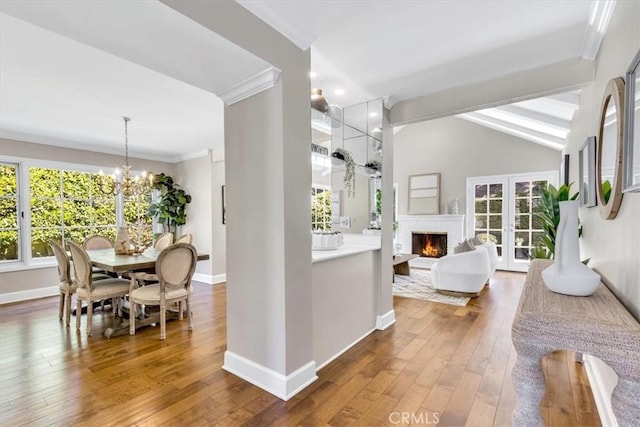 33972 Cape Cv, Dana Point, CA 92629 - interior space featuring a wealth of natural light, ornamental molding, baseboards, and wood-type flooring