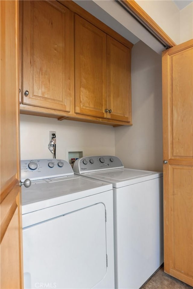 washroom featuring independent washer and dryer