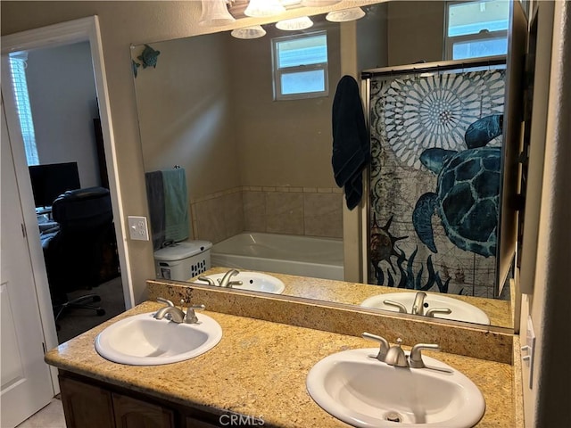 full bath featuring a bath and a sink
