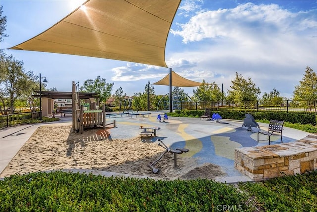 surrounding community with a patio area and fence