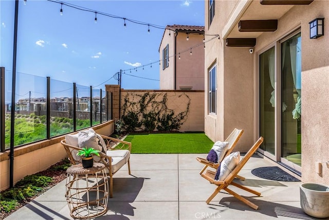 view of patio with fence