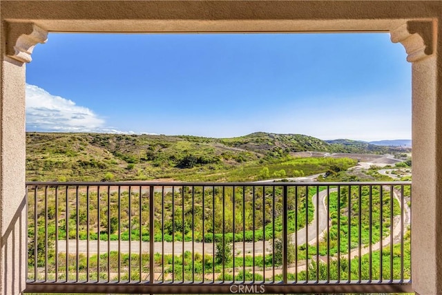 balcony featuring a mountain view