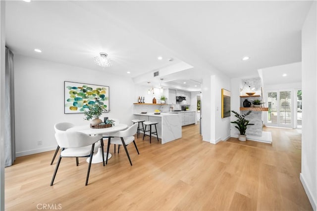 dining area with visible vents, recessed lighting, baseboards, and light wood-style floors
