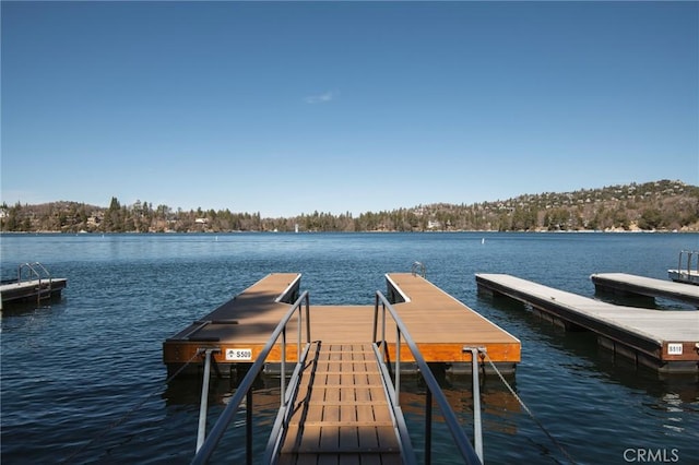view of dock featuring a water view