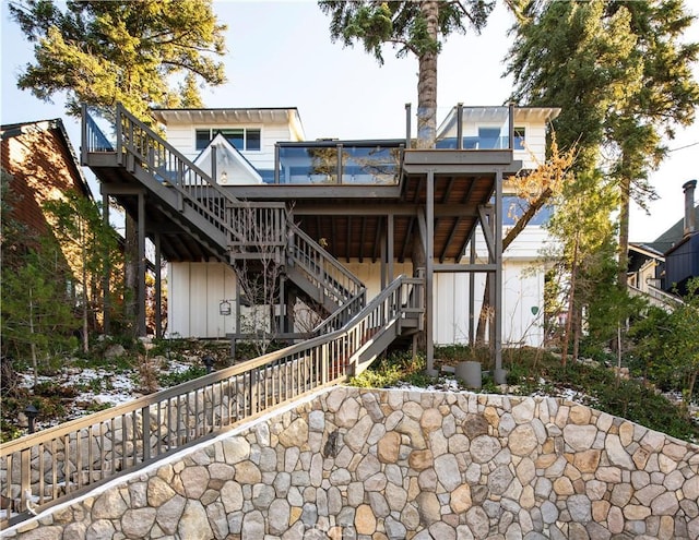 view of front facade featuring a deck and stairway