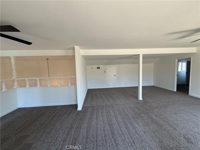 2440 Amelgado Dr, Hacienda Heights, CA 91745 - unfurnished room with dark colored carpet, baseboards, a textured ceiling, and a ceiling fan