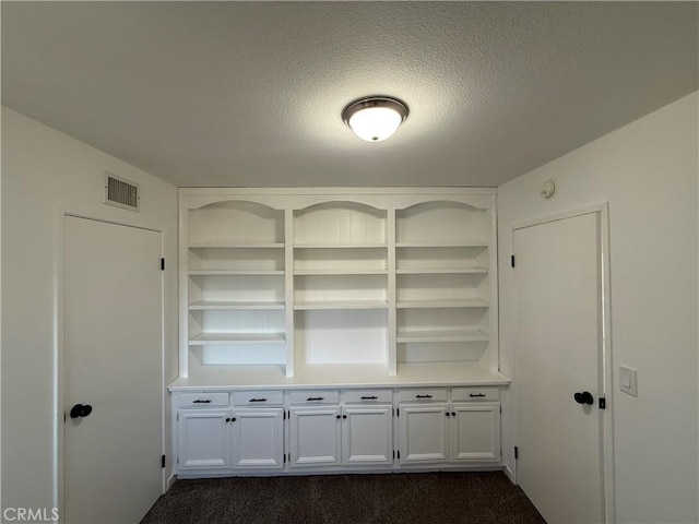 2440 Amelgado Dr, Hacienda Heights, CA 91745 - interior space featuring visible vents, carpet flooring, and a textured ceiling