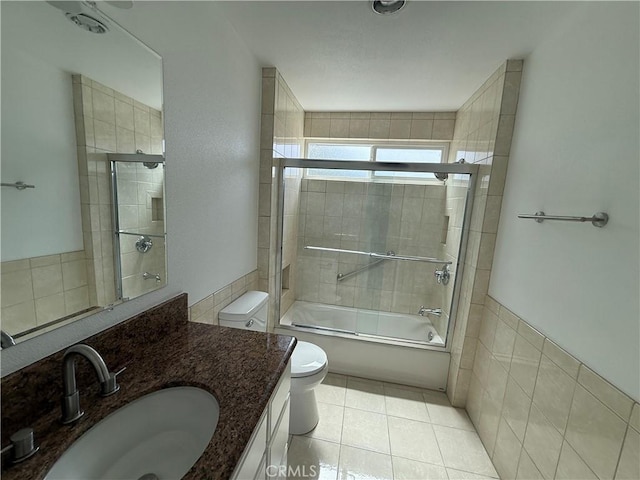 2440 Amelgado Dr, Hacienda Heights, CA 91745 - full bathroom with tile patterned floors, combined bath / shower with glass door, toilet, and vanity