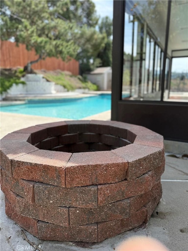 2440 Amelgado Dr, Hacienda Heights, CA 91745 - pool with fence and an outdoor fire pit