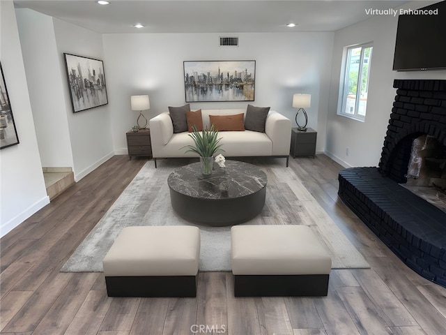 2440 Amelgado Dr, Hacienda Heights, CA 91745 - living room with visible vents, baseboards, and wood finished floors