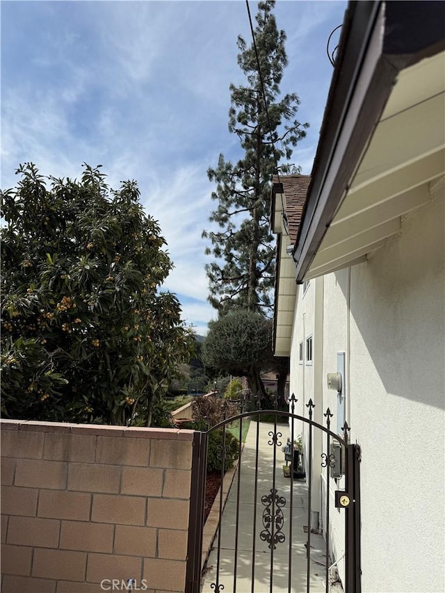 2440 Amelgado Dr, Hacienda Heights, CA 91745 - exterior space with stucco siding, fence, and a gate