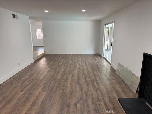 2440 Amelgado Dr, Hacienda Heights, CA 91745 - unfurnished living room featuring visible vents, recessed lighting, baseboards, and dark wood-style flooring