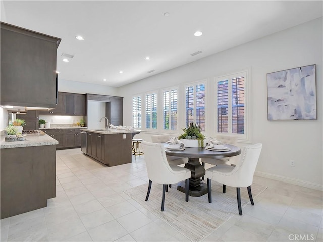 dining area with baseboards, visible vents, recessed lighting, and light tile patterned floors