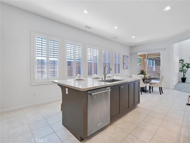 kitchen featuring recessed lighting, visible vents, a sink, and stainless steel dishwasher