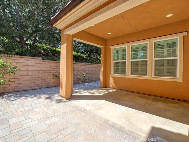 view of patio with fence