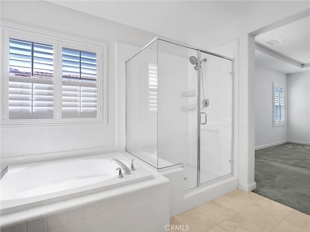 full bath with a stall shower, visible vents, tile patterned flooring, and a garden tub