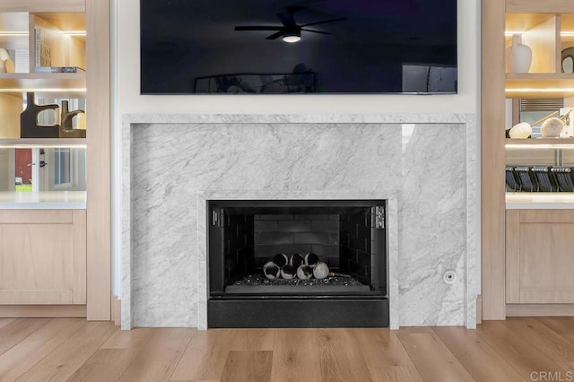 1452 Canoe Creek Way, Chula Vista, CA 91915 - interior details featuring a ceiling fan, wood finished floors, and a fireplace