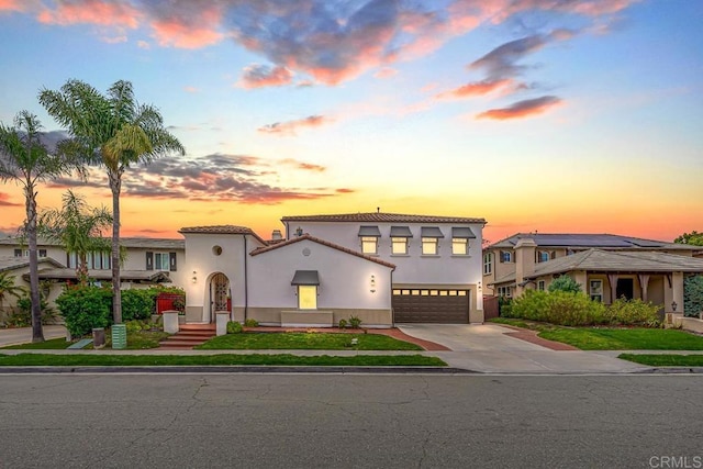 1452 Canoe Creek Way, Chula Vista, CA 91915 - mediterranean / spanish-style home featuring stucco siding, a tiled roof, driveway, and a garage