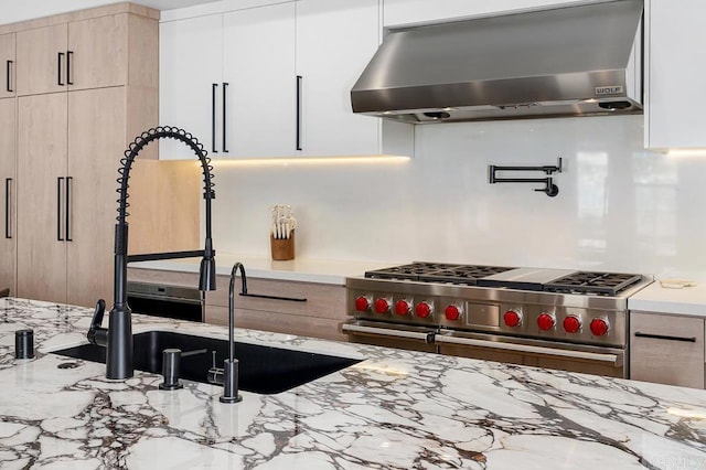 1452 Canoe Creek Way, Chula Vista, CA 91915 - kitchen featuring ventilation hood, a sink, modern cabinets, light stone counters, and range with two ovens