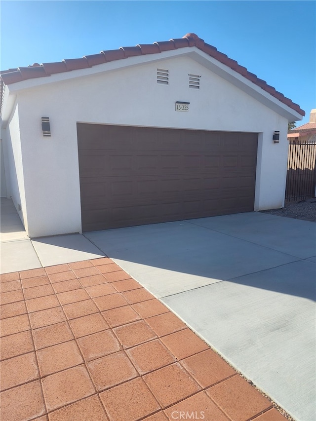 garage with driveway