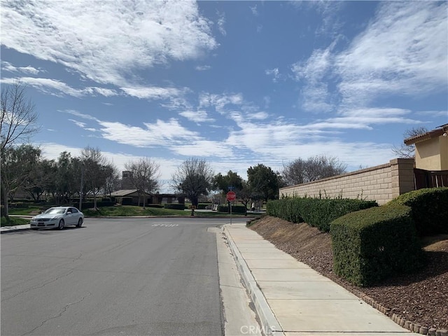 1561 Palma Bonita, Perris, CA 92571 - view of road featuring traffic signs, curbs, and sidewalks