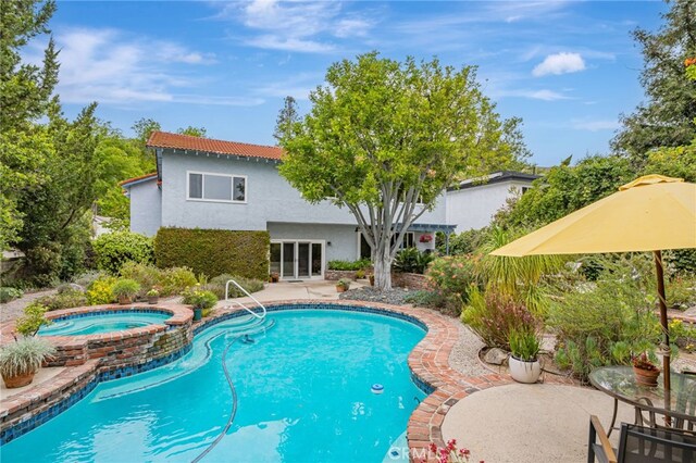 27072 Esward Dr, Calabasas, CA 91301 - outdoor pool featuring an in-ground hot tub and a patio