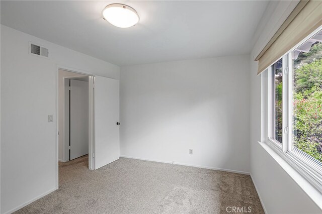 27072 Esward Dr, Calabasas, CA 91301 - carpeted empty room with plenty of natural light and baseboards