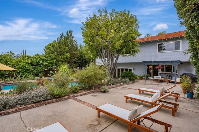27072 Esward Dr, Calabasas, CA 91301 - view of patio with a pergola and an outdoor pool