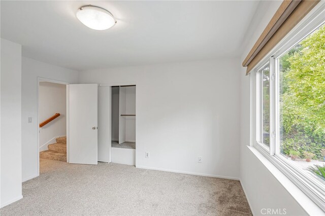 27072 Esward Dr, Calabasas, CA 91301 - unfurnished bedroom with multiple windows, carpet, and baseboards
