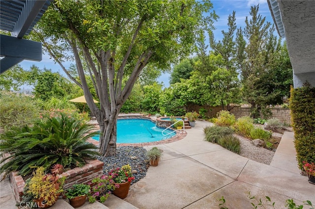 27072 Esward Dr, Calabasas, CA 91301 - view of swimming pool with a patio area, a fenced backyard, and a pool with connected hot tub
