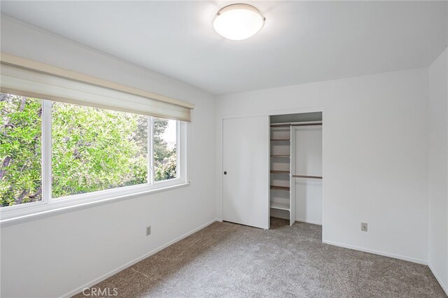 27072 Esward Dr, Calabasas, CA 91301 - unfurnished bedroom with carpet floors, a closet, and baseboards