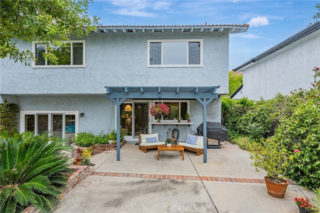 27072 Esward Dr, Calabasas, CA 91301 - rear view of house with a patio area, an outdoor living space, a pergola, and stucco siding
