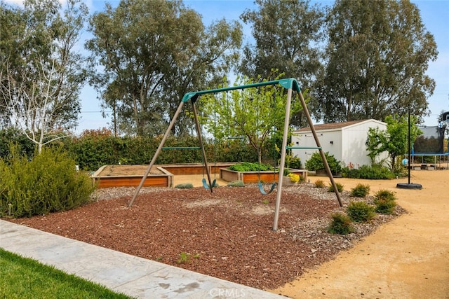 community playground featuring a trampoline