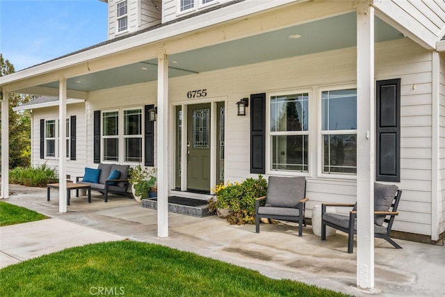 entrance to property with covered porch