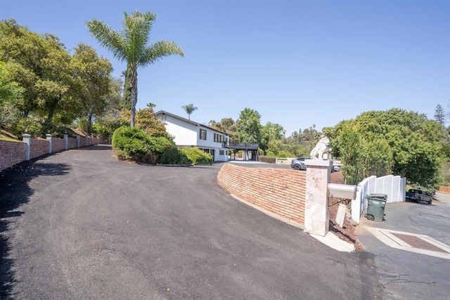 view of street featuring driveway