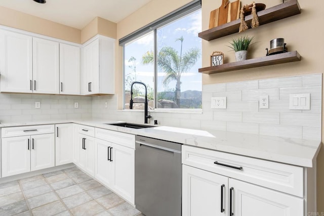 15881 Broad Oaks Rd, El Cajon, CA 92021 - kitchen featuring stainless steel dishwasher, a sink, decorative backsplash, white cabinetry, and open shelves