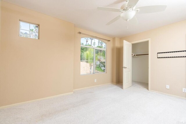 15881 Broad Oaks Rd, El Cajon, CA 92021 - unfurnished bedroom featuring light colored carpet, multiple windows, and baseboards