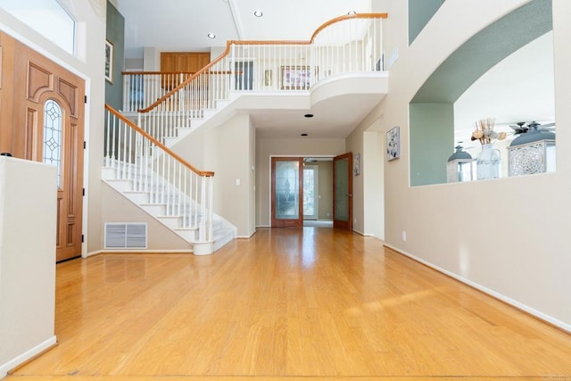 15881 Broad Oaks Rd, El Cajon, CA 92021 - foyer with a high ceiling, wood finished floors, stairway, and baseboards