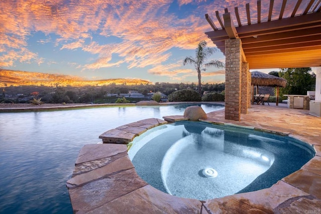 15881 Broad Oaks Rd, El Cajon, CA 92021 - pool at dusk with a patio area, a gazebo, and a pool with connected hot tub